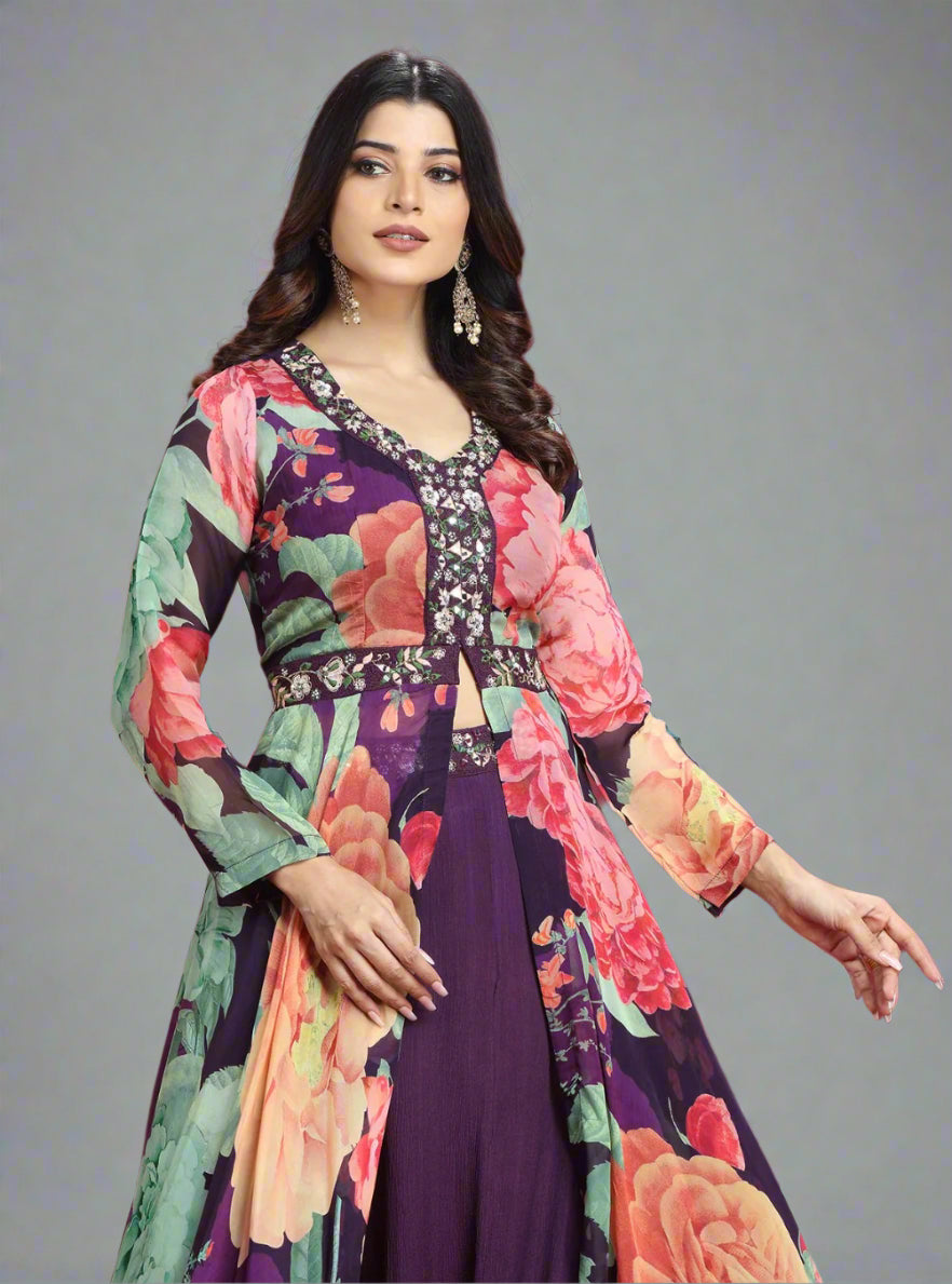 Woman wearing a colorful floral dress against a red background